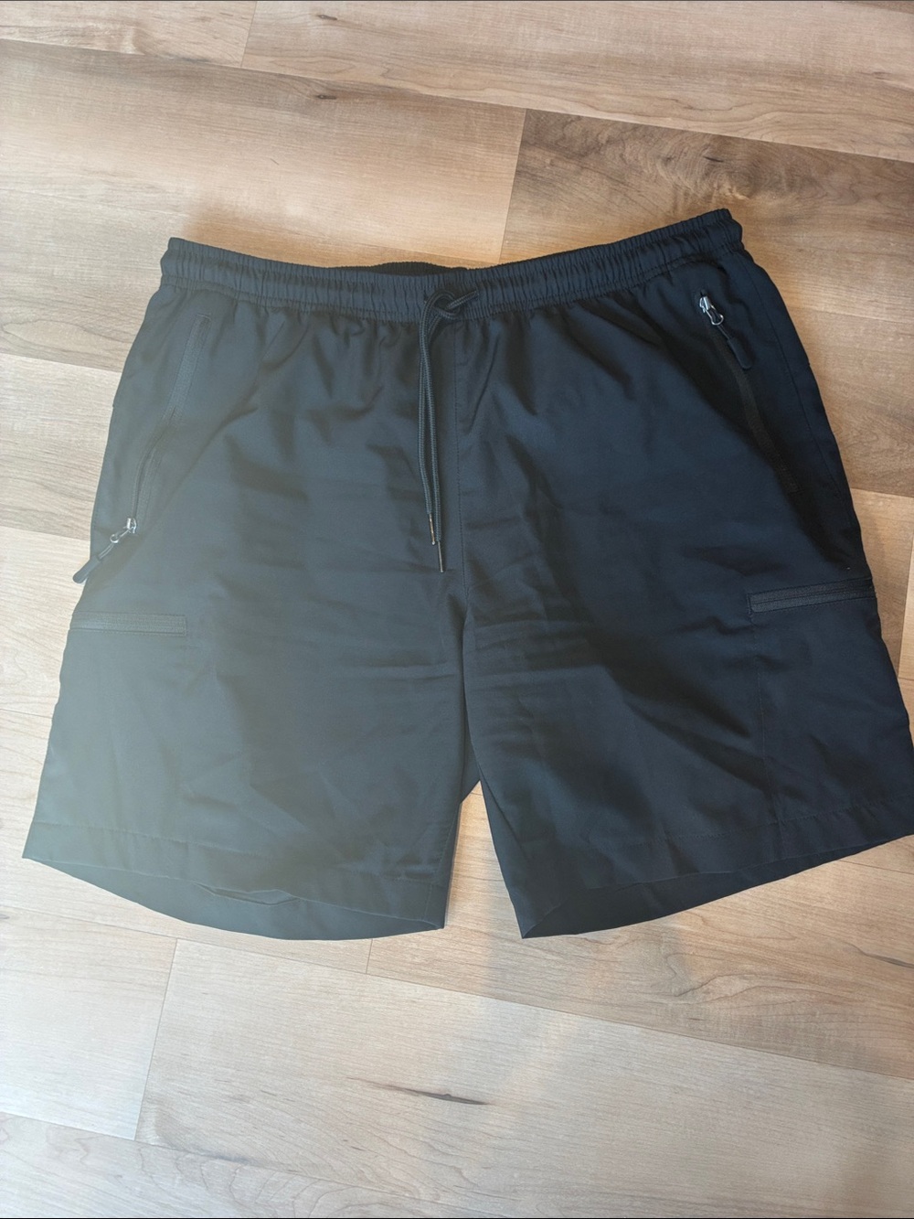 Black Athletic Shorts with Zipper Pockets and Drawcord Waist